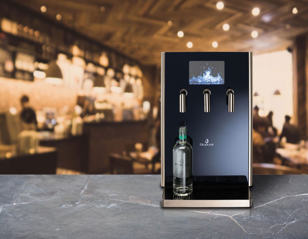 Stone table top and blurred bokeh cafe and coffee shop interior background with vintage filter - can used for display or montage your products.